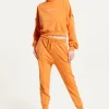House of Holland Tracksuit Bottoms in Orange with a Drawstring Waist
